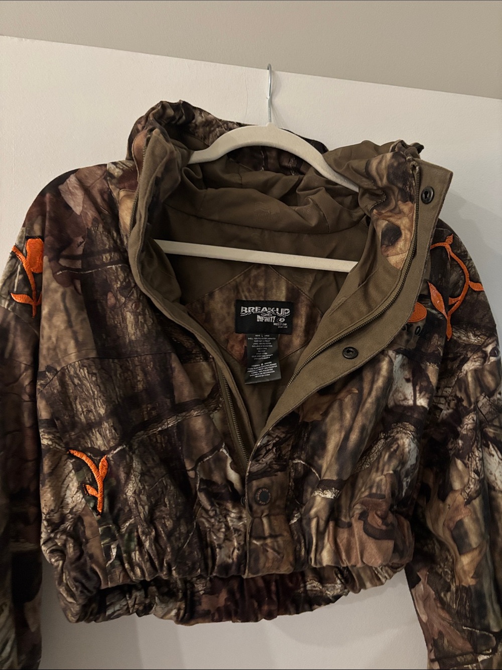Custom Mossy Oak Camo Hooded Jacket with Orange Accents. Never worn
